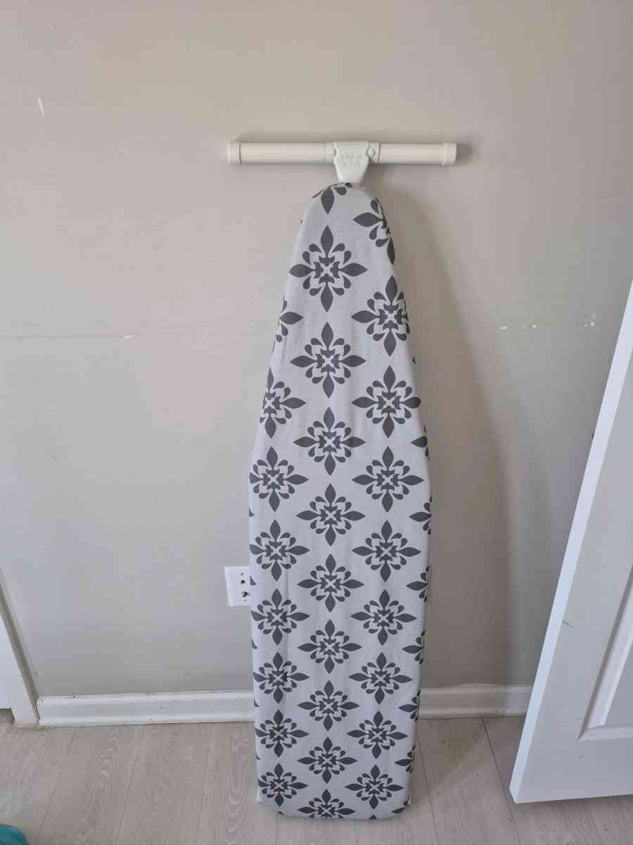 ironing board and iron and celebration glass