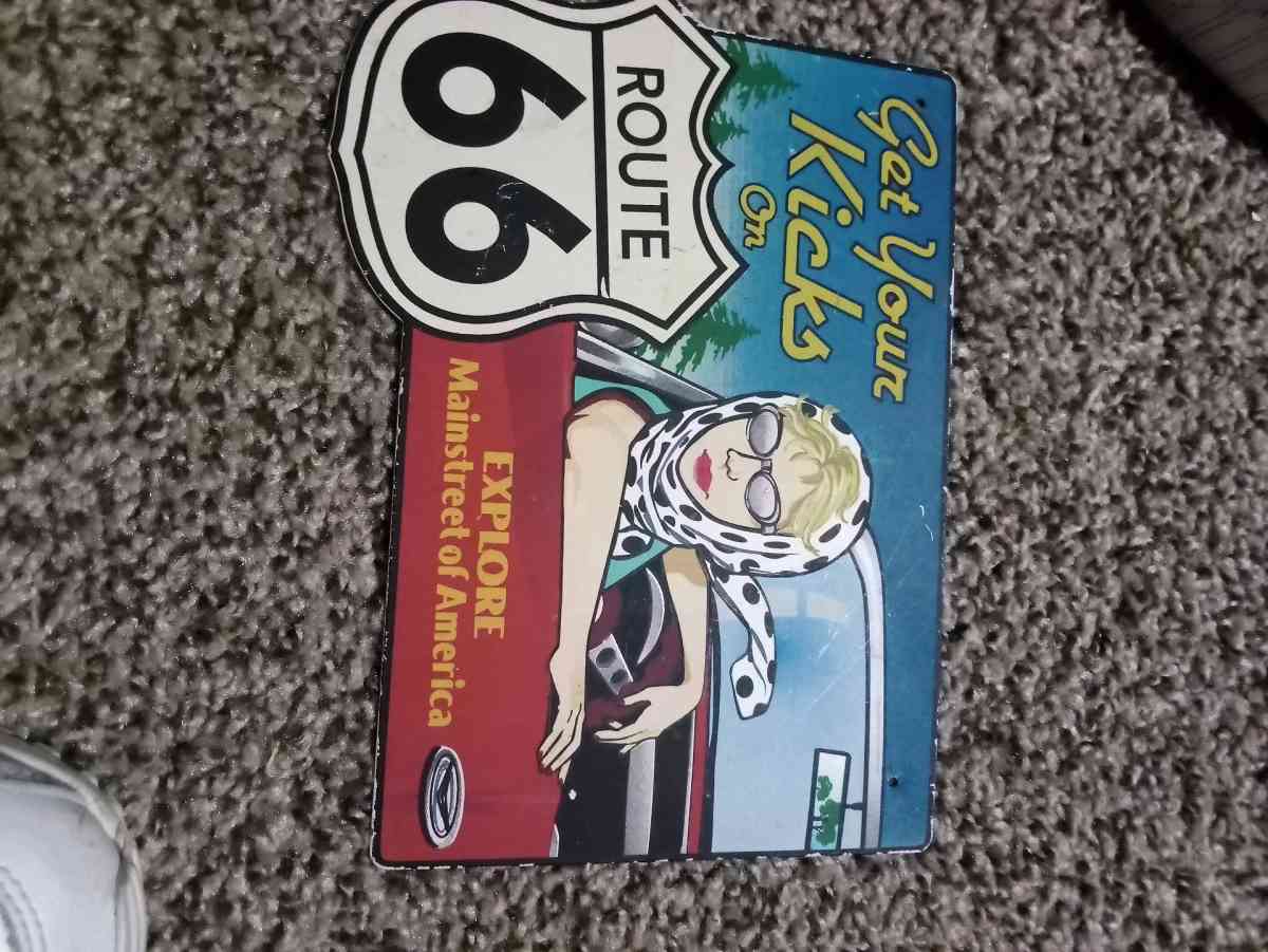 route 66 sign with woman - Mc Minnville, Tennessee