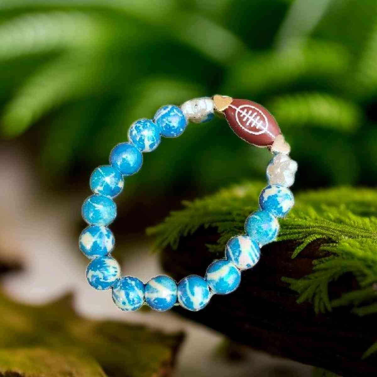 Football bracelet with blue accent beads - Greenville, Michigan - FleaMarketBay