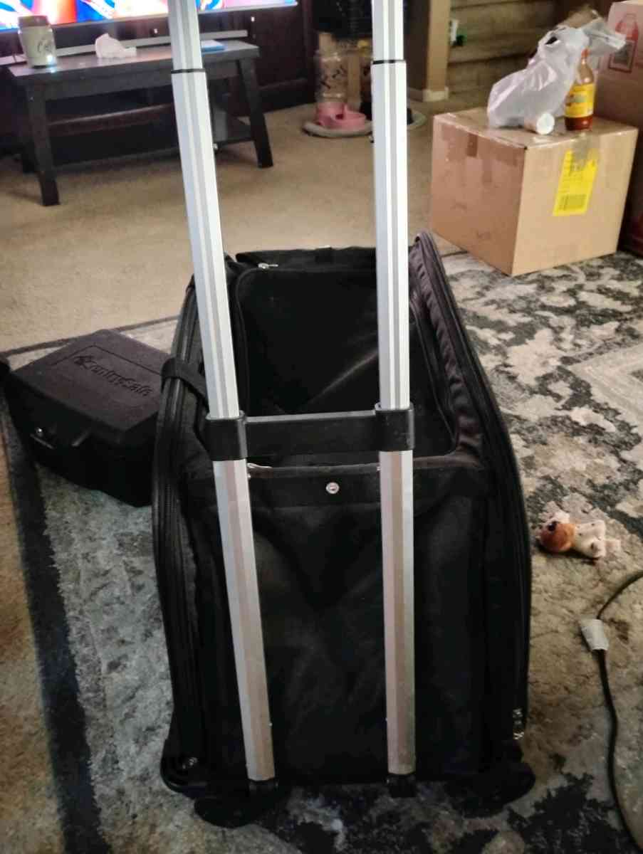 dog carrier and a roller - Casa Grande, Arizona - FleaMarketBay