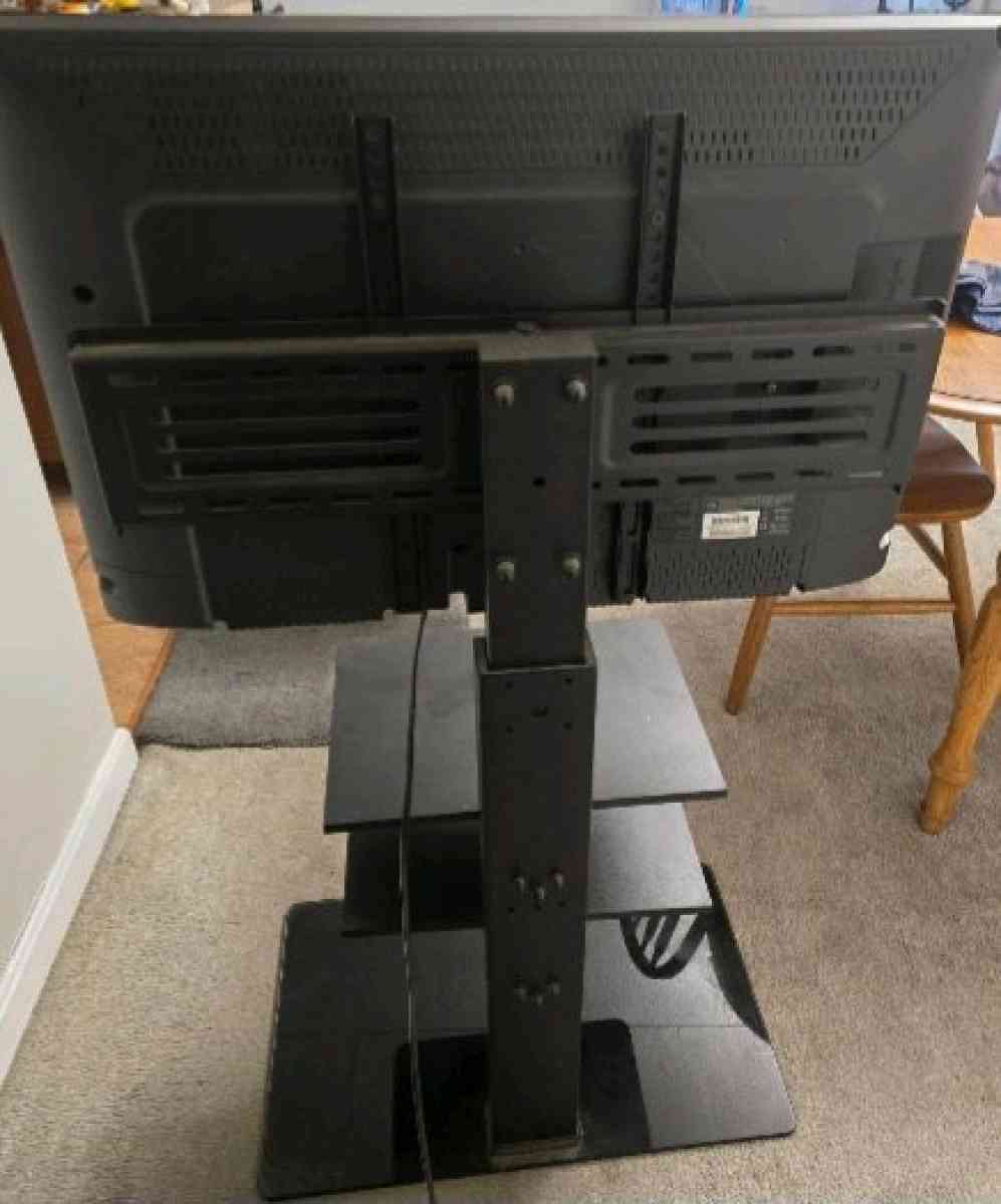 30 inch Emerson flat screen smart tv and 3 shelf TV stand - Stoneham, Massachusetts