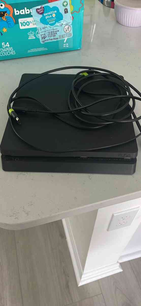 PlayStation 4 with 2 controllers - Saint Cloud, Florida - FleaMarketBay