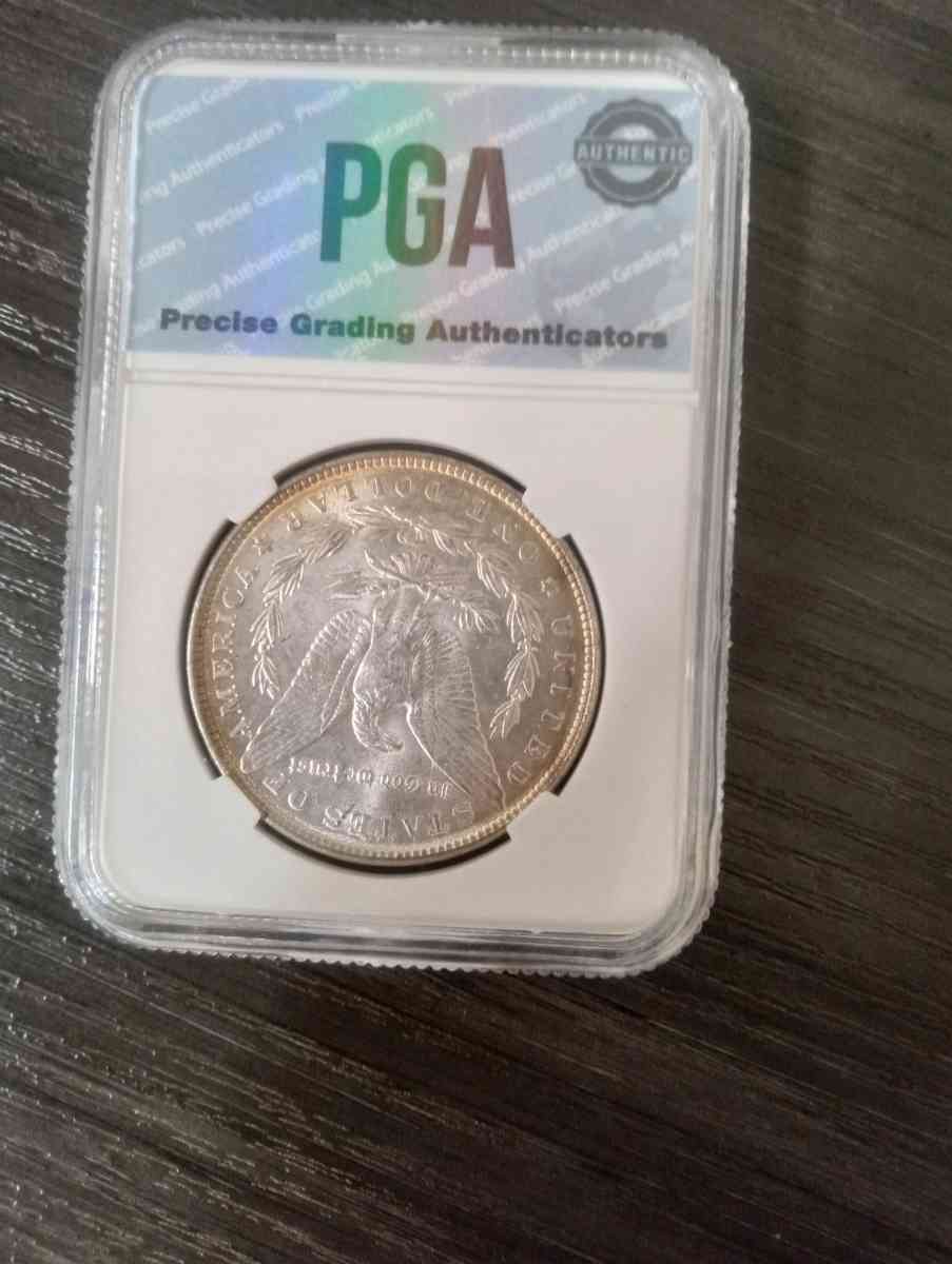 1886 Morgan Dollar with Beautiful Toinig rainbow - Alicia, Arkansas - FleaMarketBay