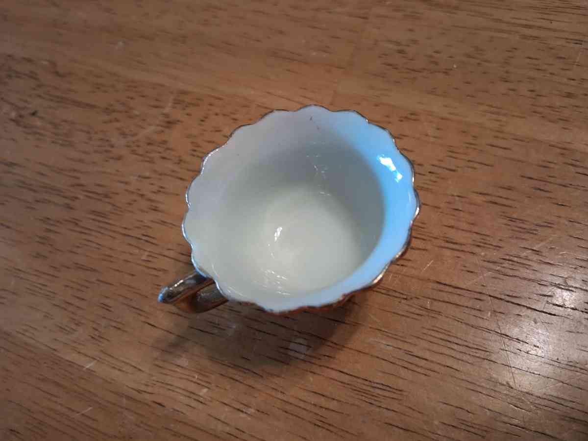 orange and pink flower design tiny teacup - Comstock, Michigan - FleaMarketBay