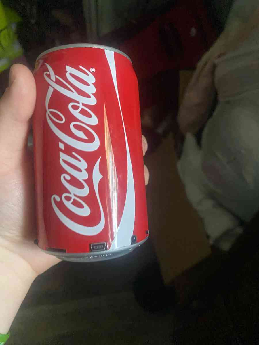 books and a CocaCola speaker - Alamogordo, New Mexico - FleaMarketBay