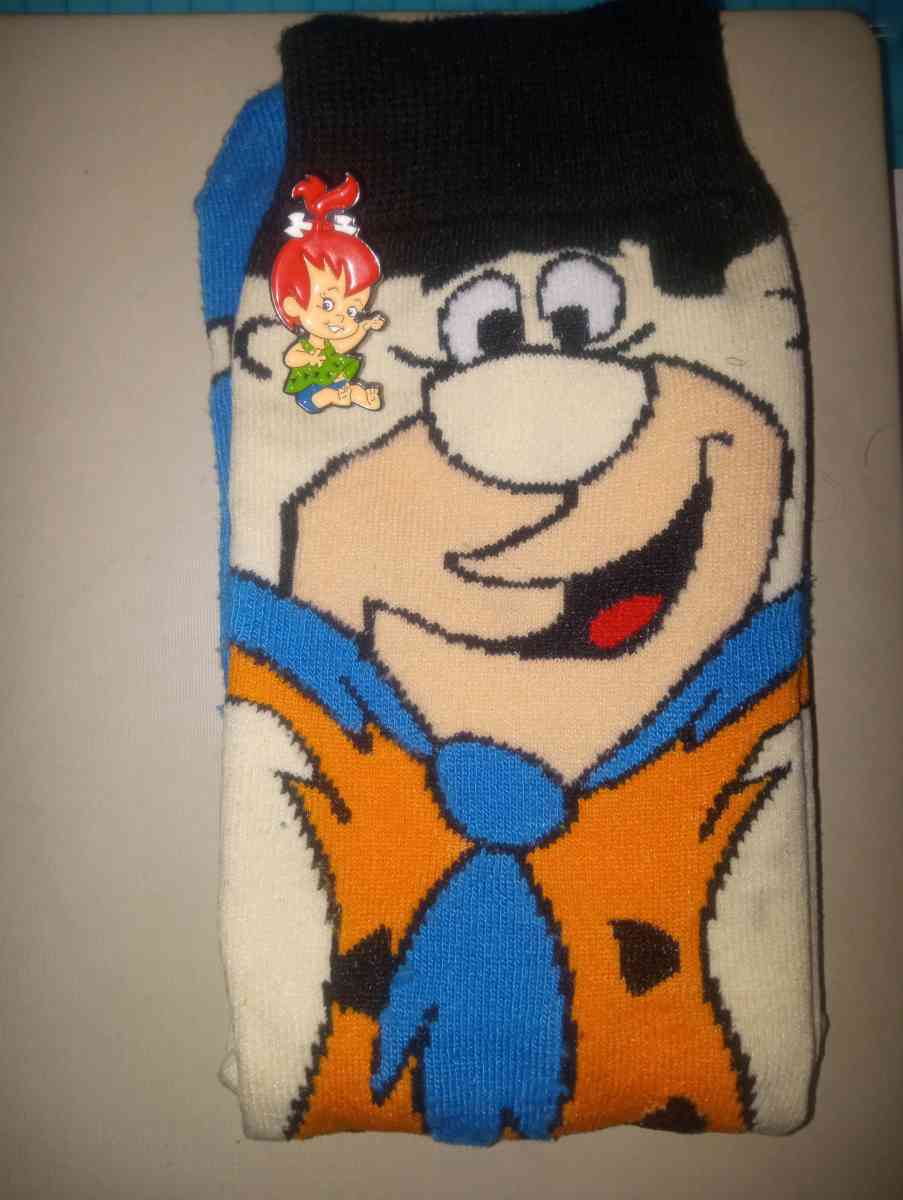 Fred Flintstone socks collectible with a pebbles pin - Merry Hill, North Carolina - FleaMarketBay