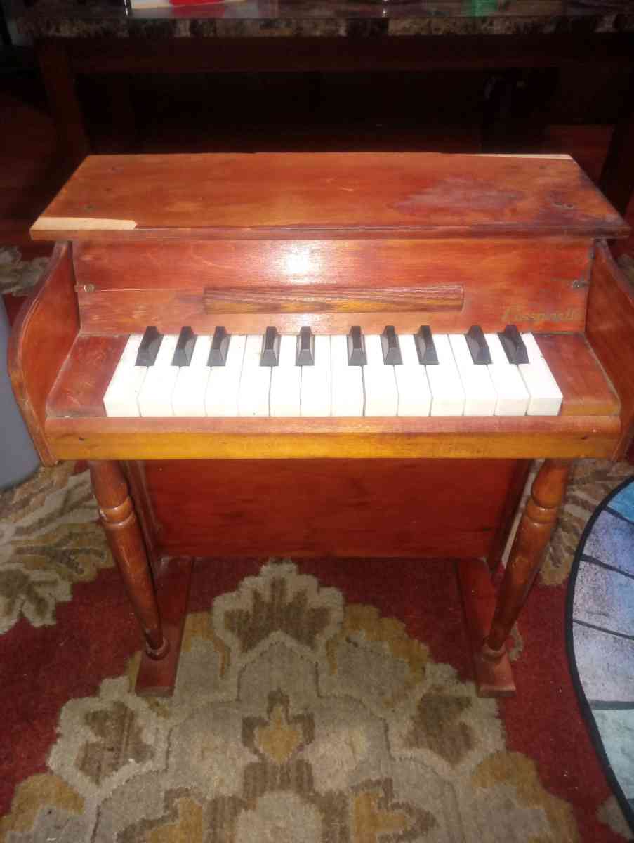 small antique vintage piano