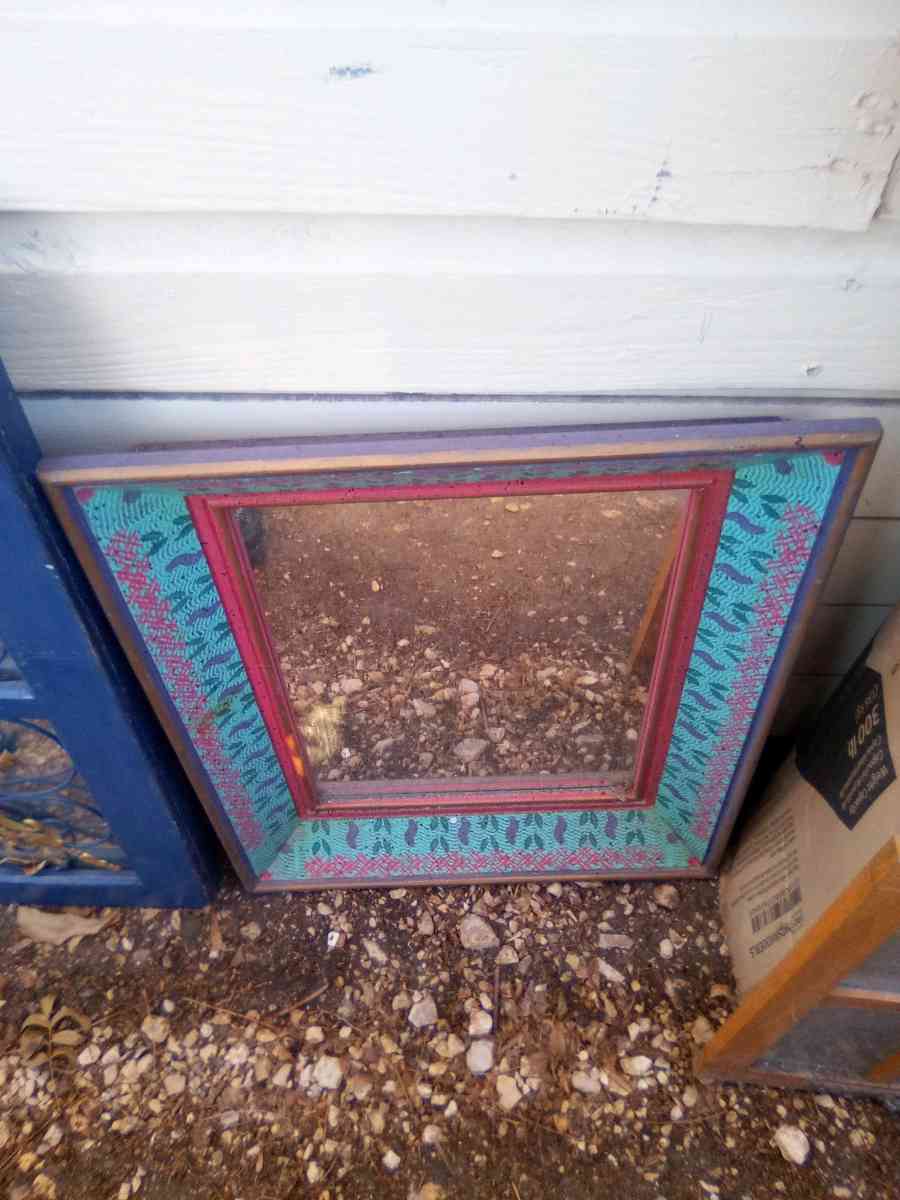 large mirror  small Spanish mirror