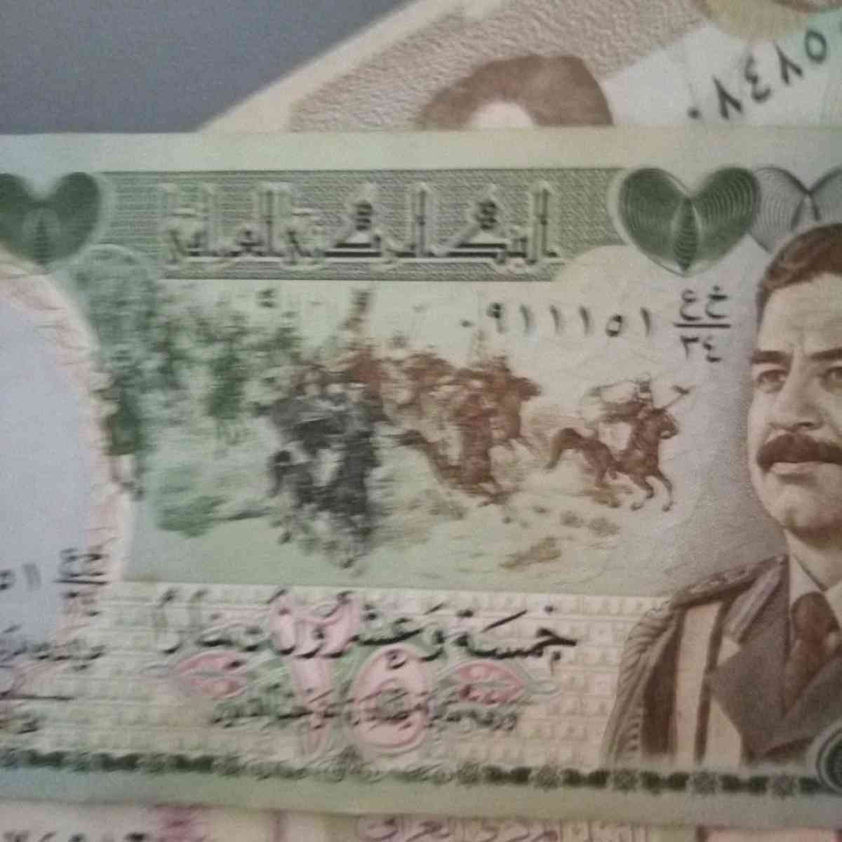 a large lot of Iraqi war currency  1980 to 1991 - Naples, Florida - FleaMarketBay