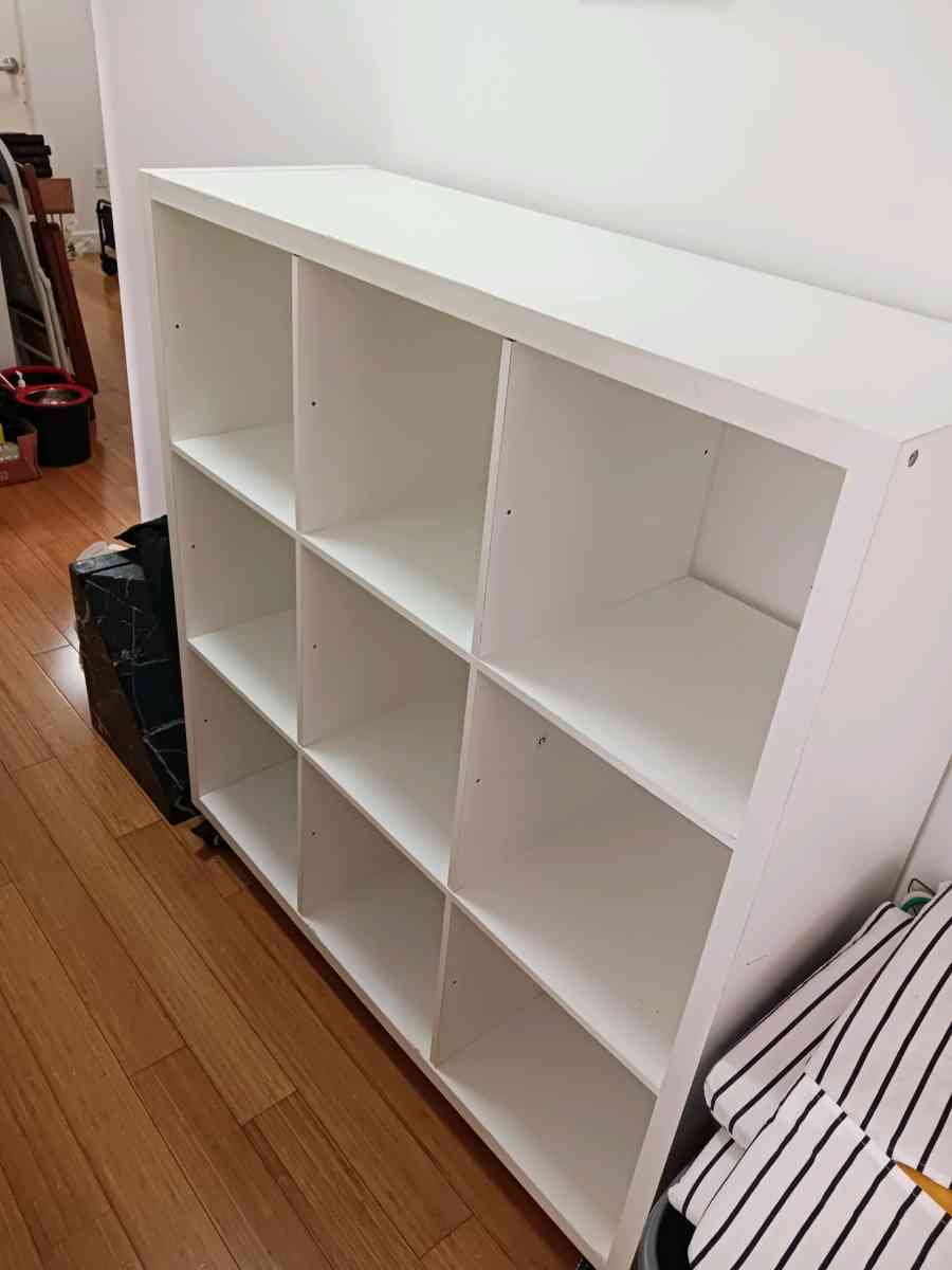 White Bookshelf on Wheels  9 Cube Storage Scratches  Holes - Bronx, New York - FleaMarketBay
