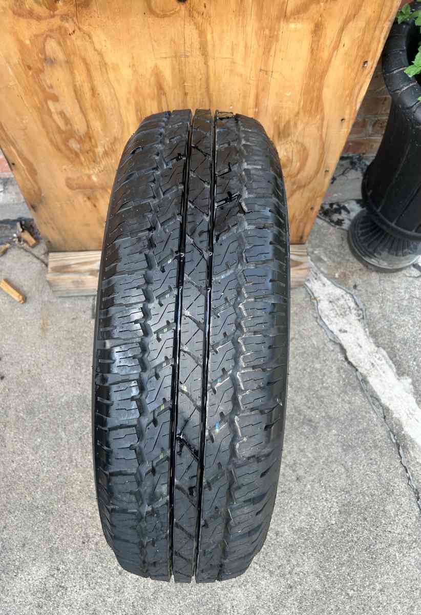 Bridgestone Dueler Tire AT 24575R17 - Bridgeview, Illinois - FleaMarketBay
