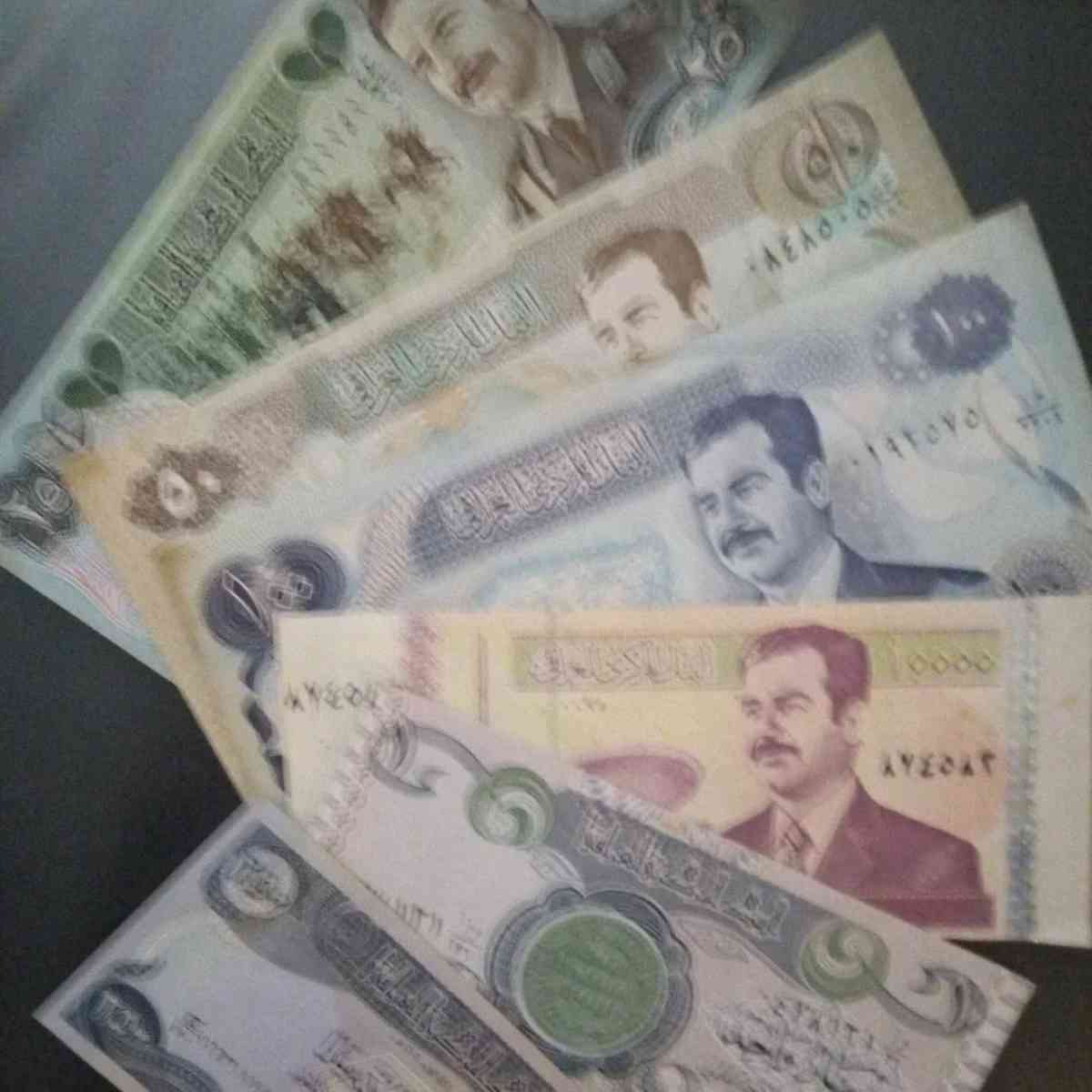 a large lot of Iraqi war currency  1980 to 1991