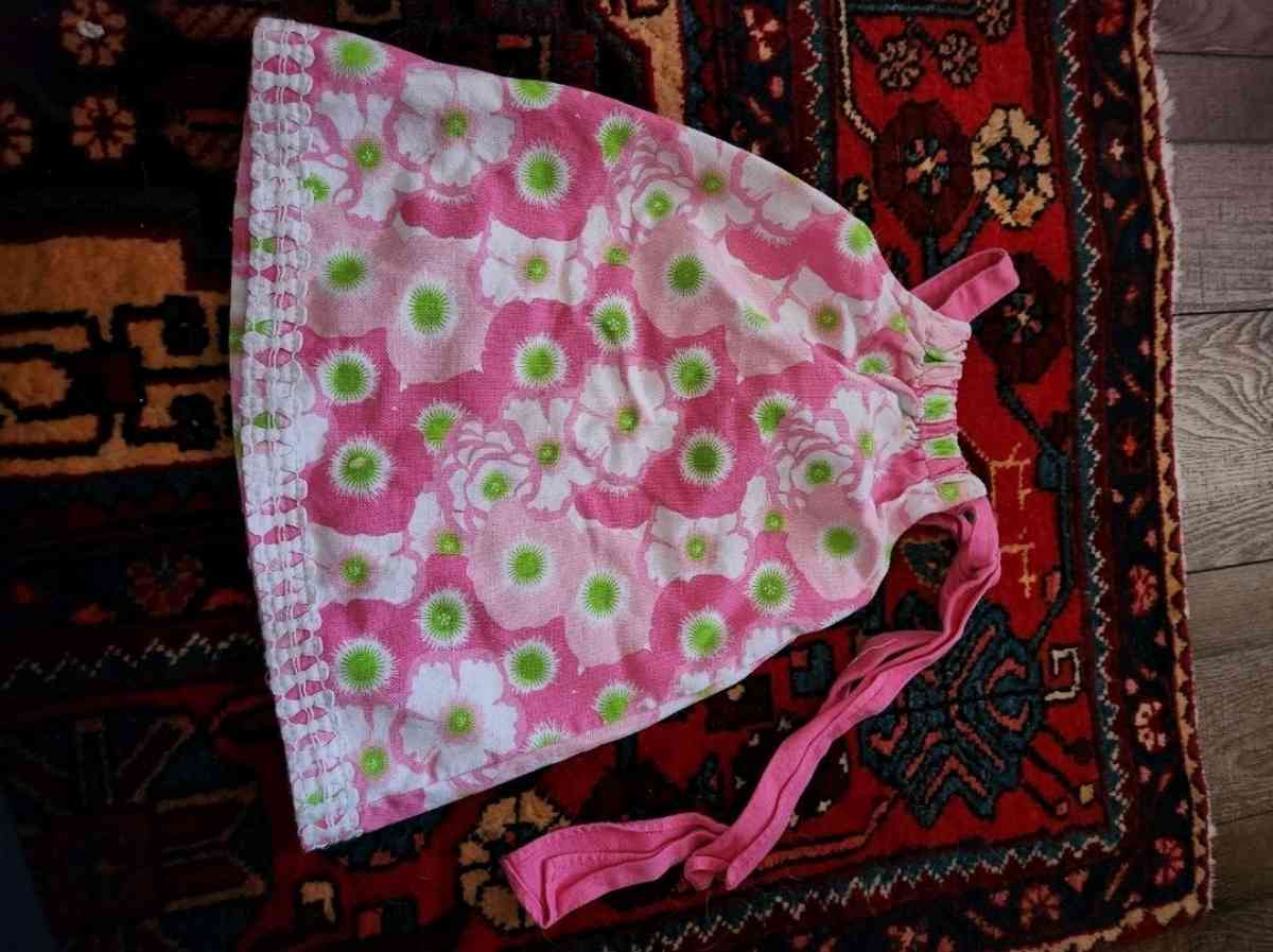 Girl pink dress with green accents