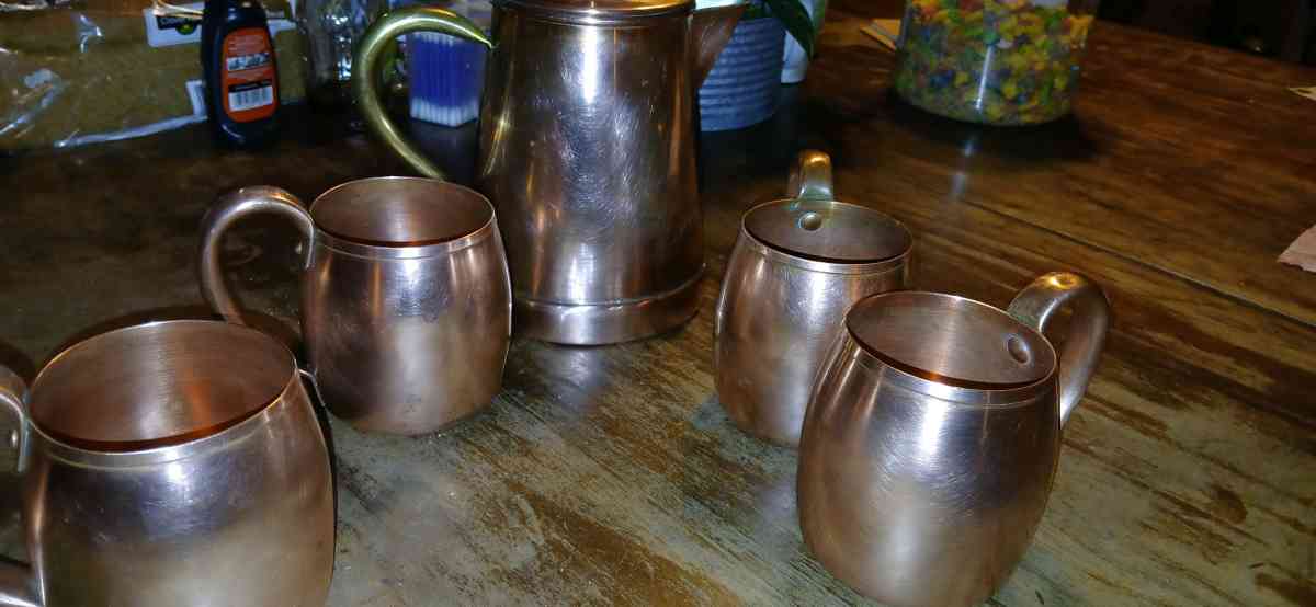solid copper cups and a coffee pot - Jacksonville, Arkansas - FleaMarketBay