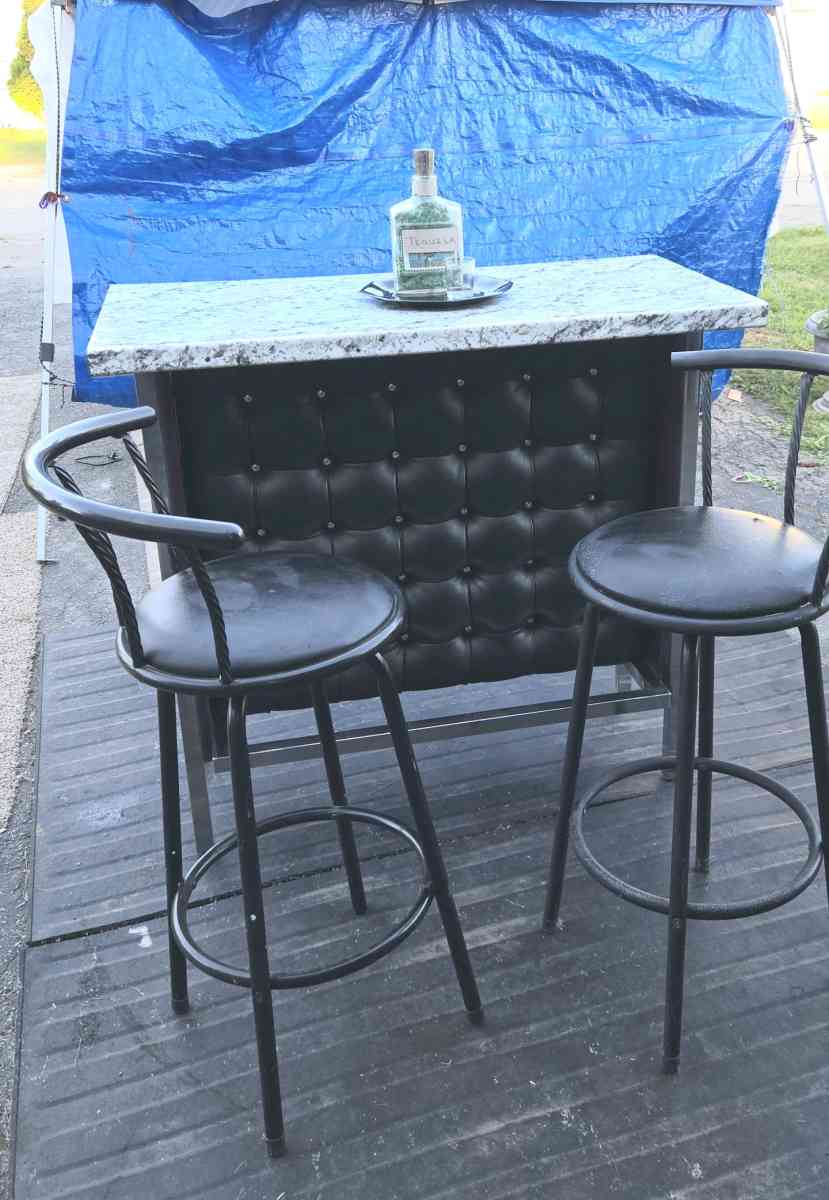 dry bar with 3 stools