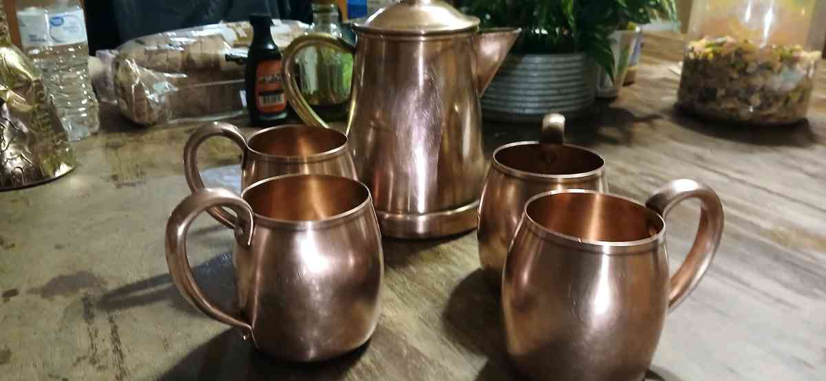 solid copper cups and a coffee pot - Jacksonville, Arkansas