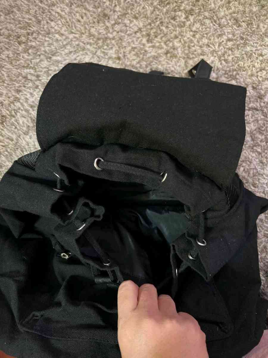 Trendy Black Canvas Backpack with Luxurious Leather Accents - Columbus, Ohio - FleaMarketBay
