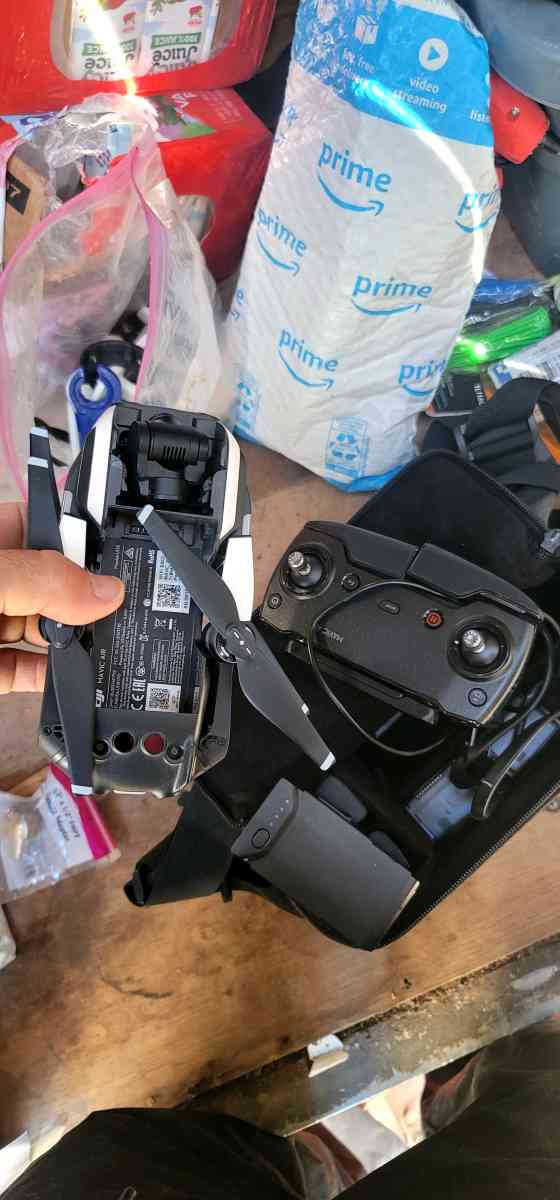 DJI mini drone with 3 batteries  accessories