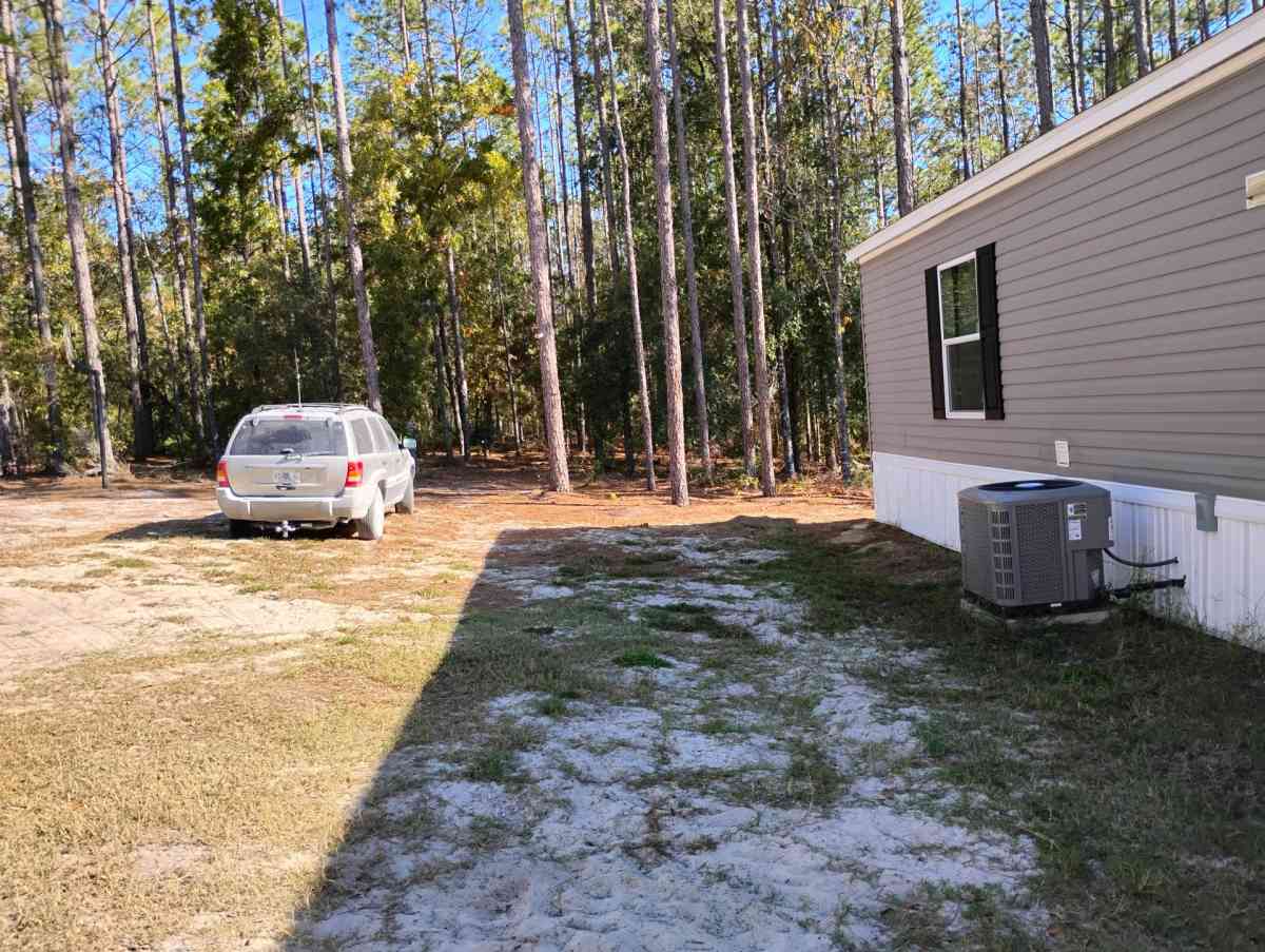 land and a single wide mobile home - Bell, Florida - FleaMarketBay