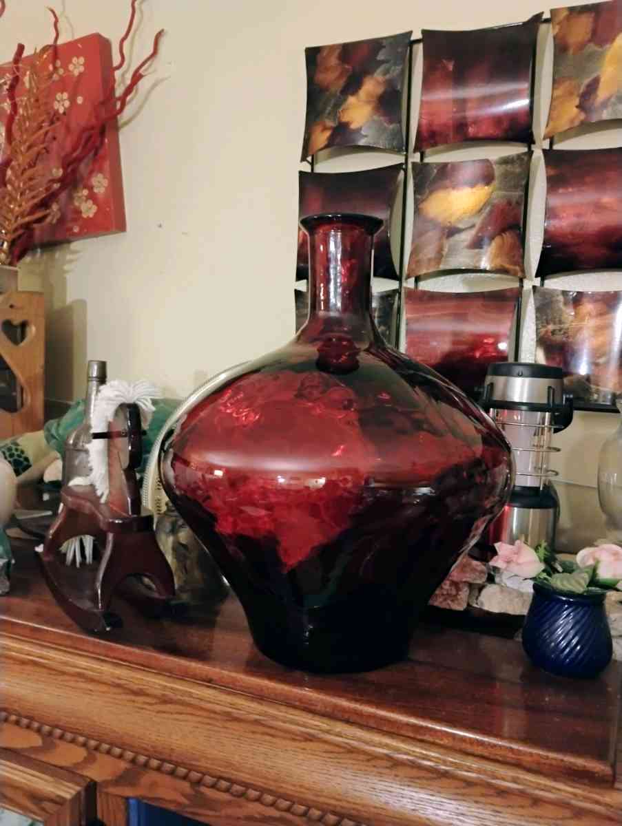 large red quality  glass bottle very heavy - Pensacola, Florida
