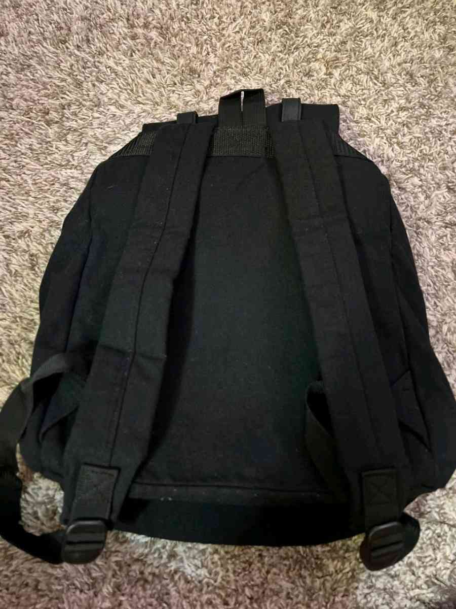 Trendy Black Canvas Backpack with Luxurious Leather Accents - Columbus, Ohio - FleaMarketBay