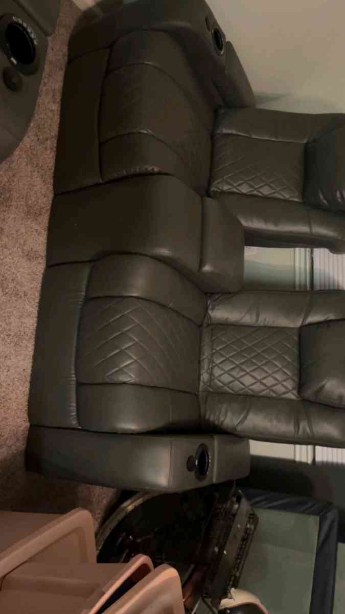 Matching Set Dark Leather Reclining Sofa and Recliner - Houston, Texas