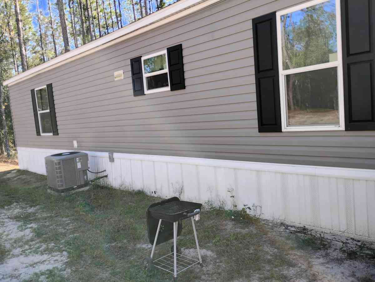 land and a single wide mobile home - Bell, Florida - FleaMarketBay