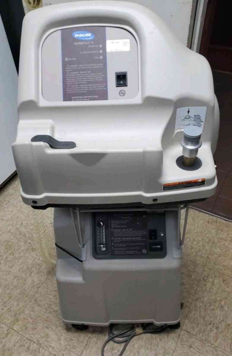Invacare Homefill 2 O2 machine bottle filler and 2 O2 tanks