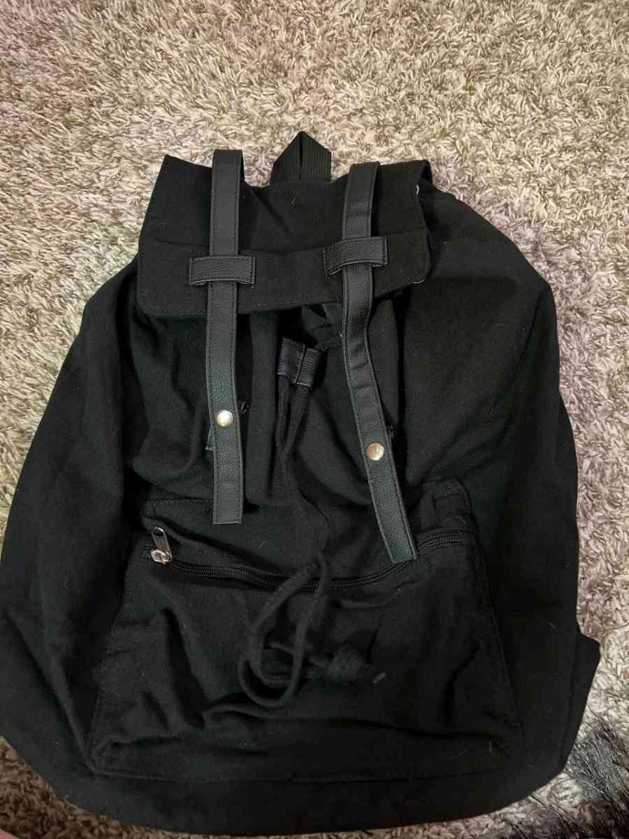 Trendy Black Canvas Backpack with Luxurious Leather Accents - Columbus, Ohio - FleaMarketBay