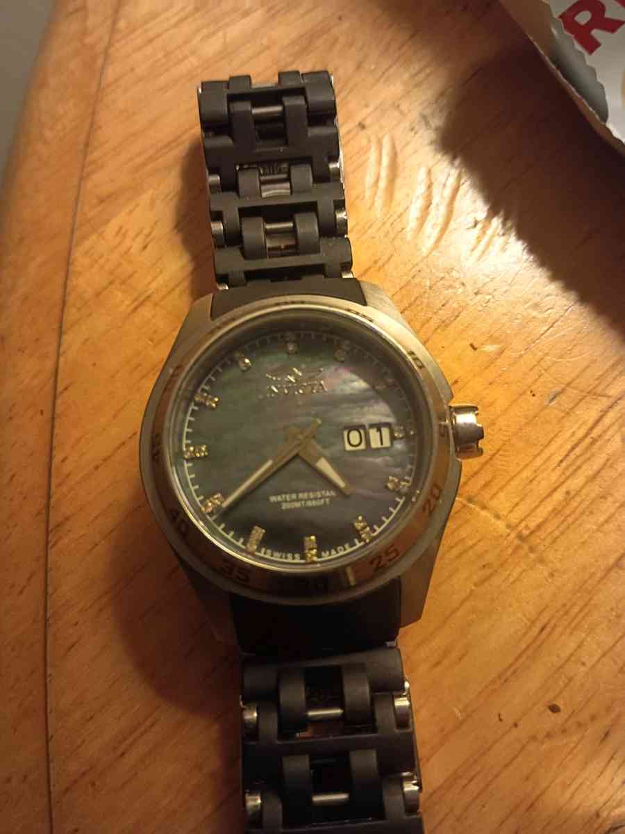 invicta mother of pearl dial watch - Rochester, New York