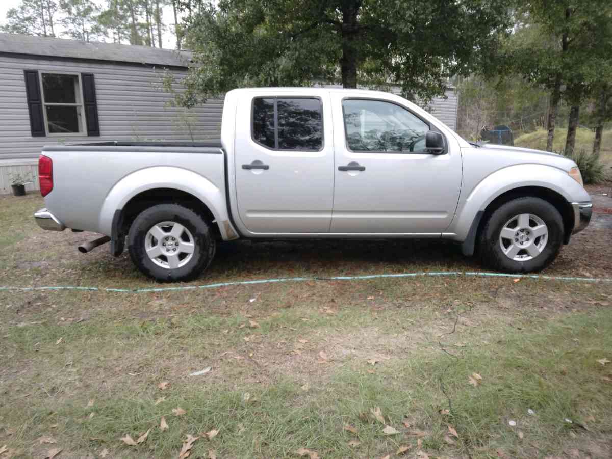 2005 Nissan 4 door crew cab pick up truck V6 - Hastings, Florida - FleaMarketBay