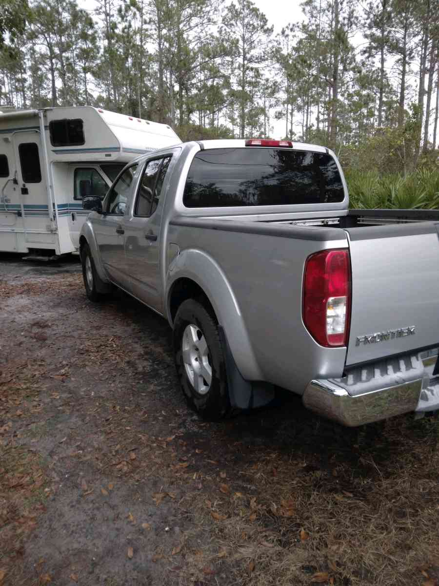 2005 Nissan 4 door crew cab pick up truck V6 - Hastings, Florida - FleaMarketBay
