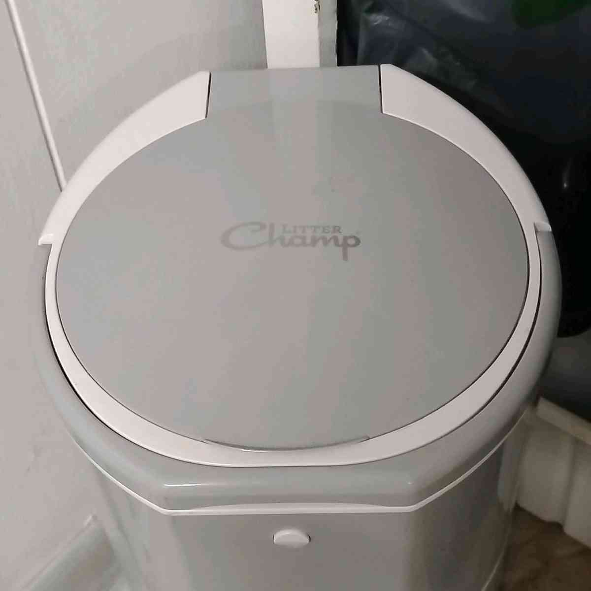 litter champ and 2 boxes of replacement bags - Little River, South Carolina - FleaMarketBay