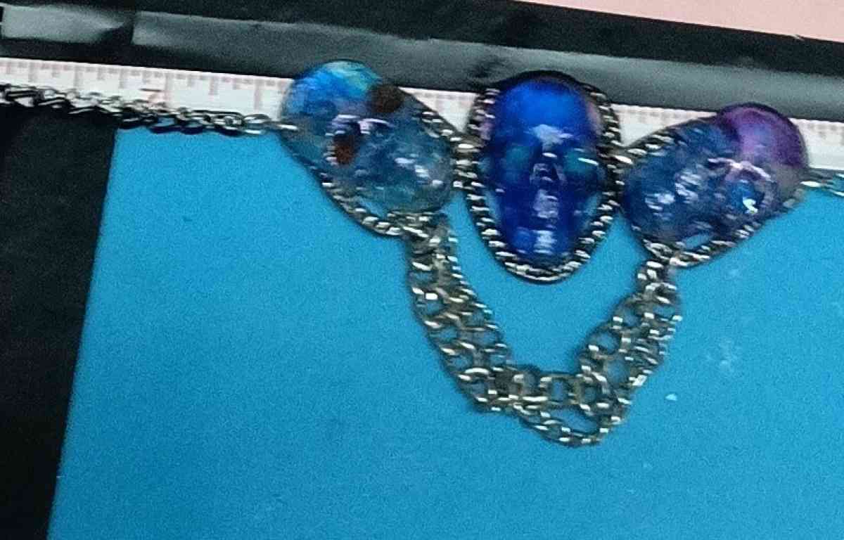 three skulls with multiple chains made with Uv resin - Lufkin, Texas