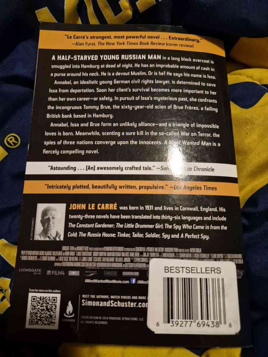 BRAND NEW copy of A MOST WANTED MAN by John Le Carre - New Baltimore, Michigan - FleaMarketBay