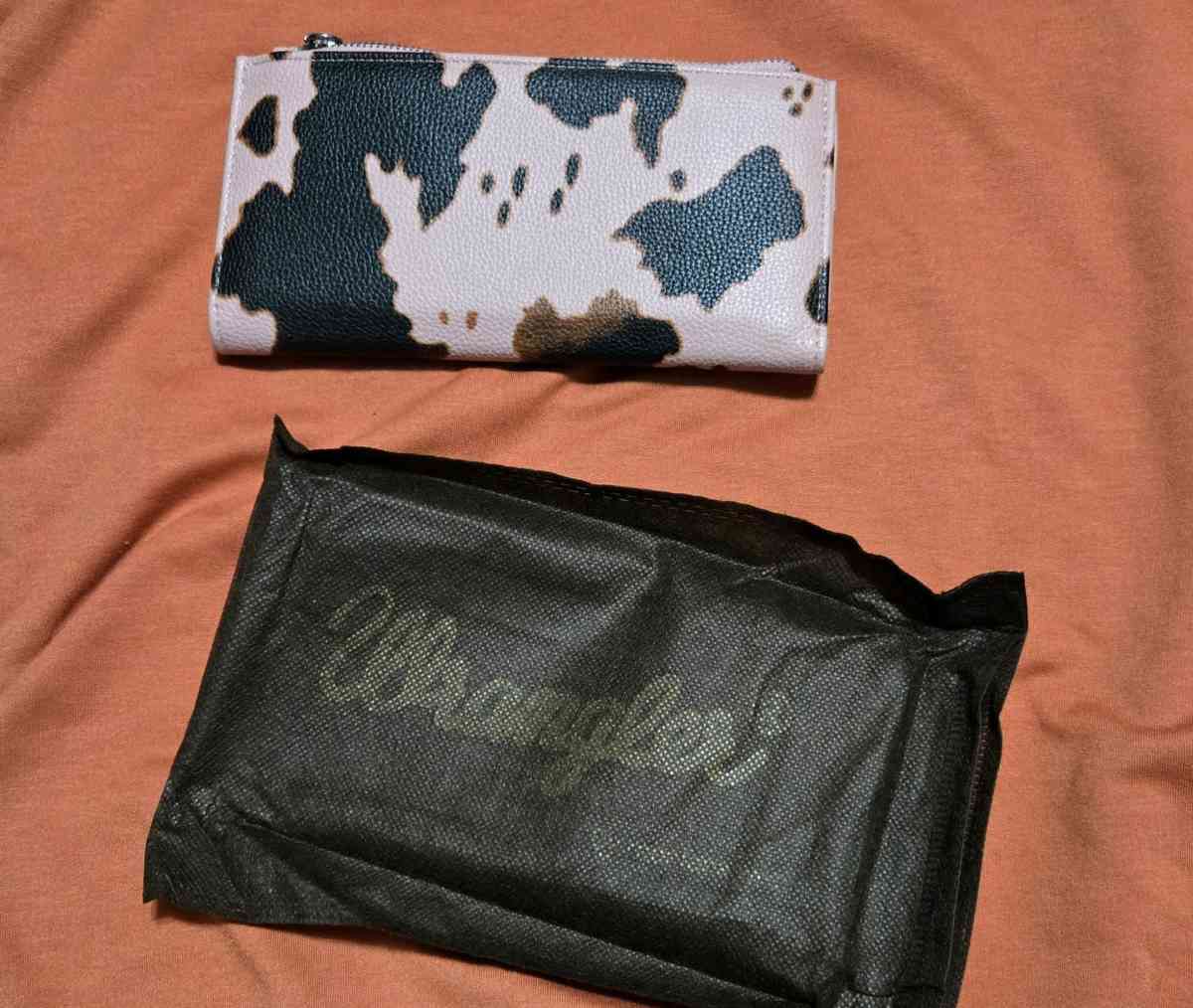 Wrangler Cow Print BiFold Wallet in Pink Cow print - Moran, Kansas - FleaMarketBay