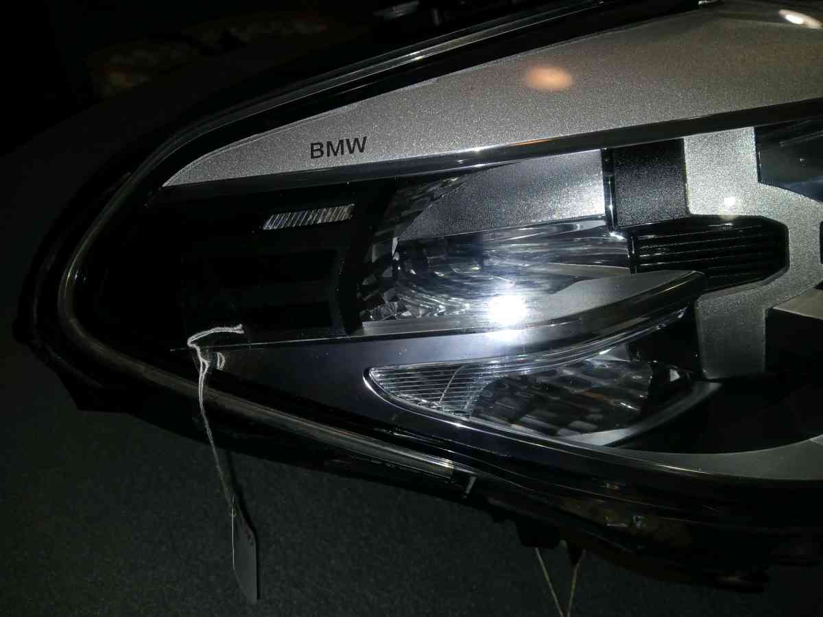 BMW headlight - Houston, Texas