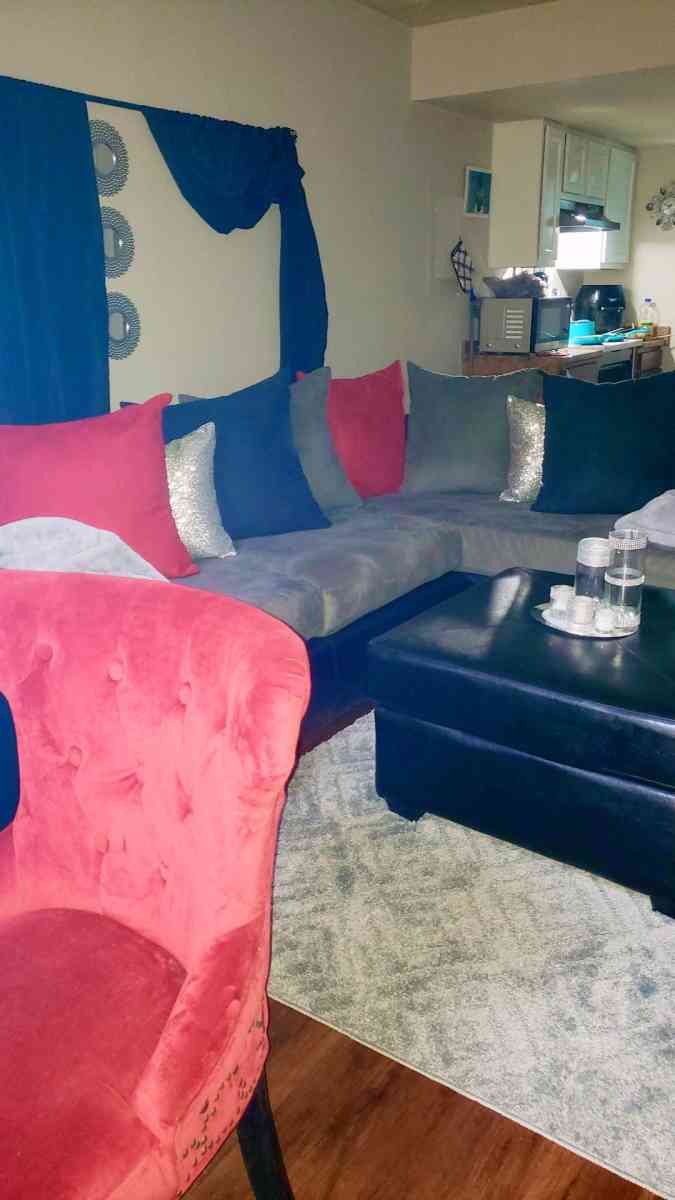 Black leather an grey sectional - Macon, Georgia