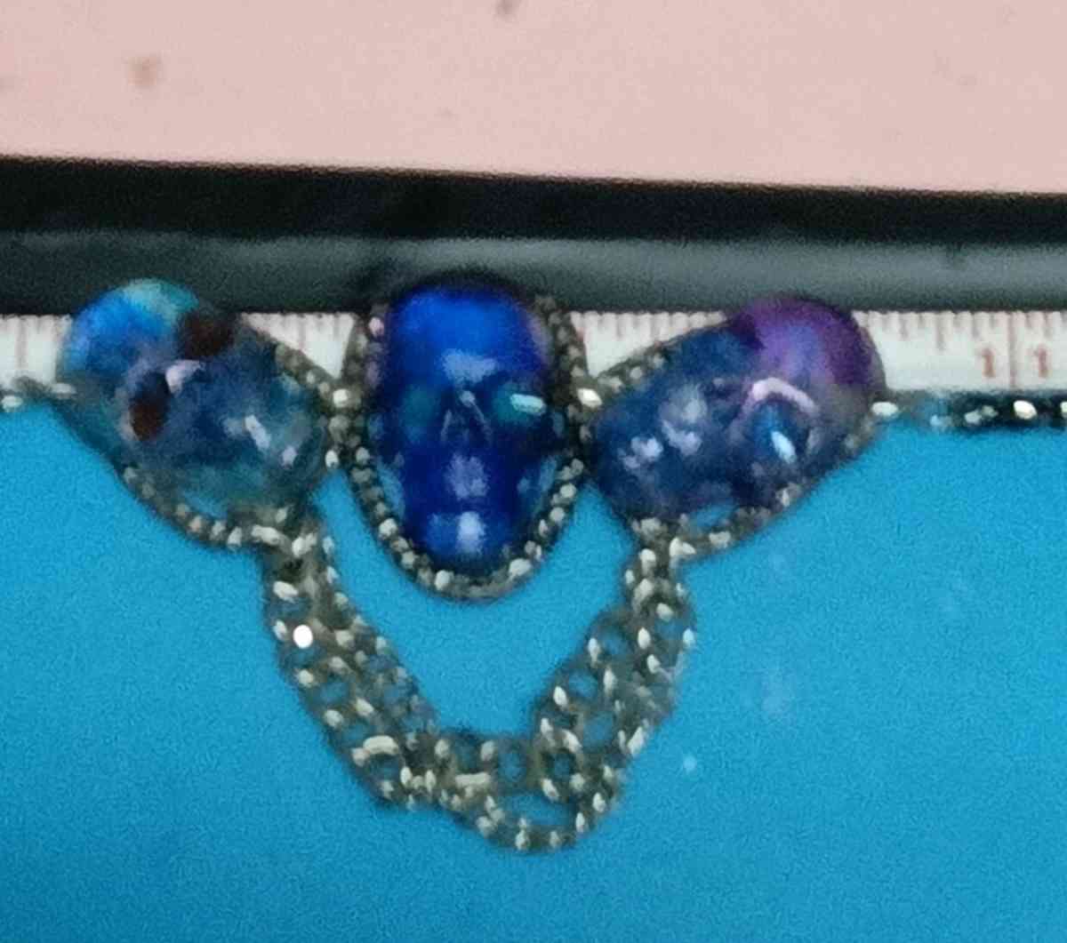 three skulls with multiple chains made with Uv resin - Lufkin, Texas - FleaMarketBay