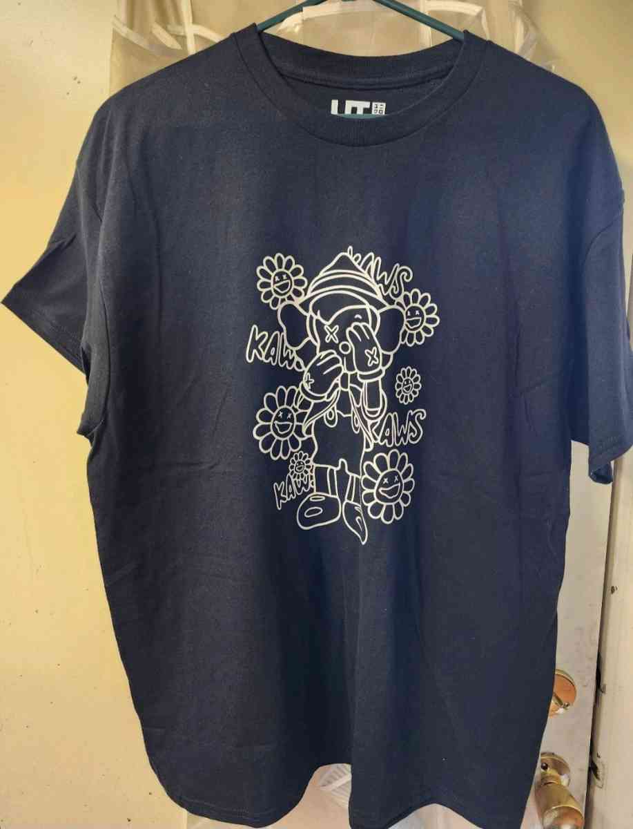 KAWS Pinocchio Shirt - Denver, Colorado - FleaMarketBay