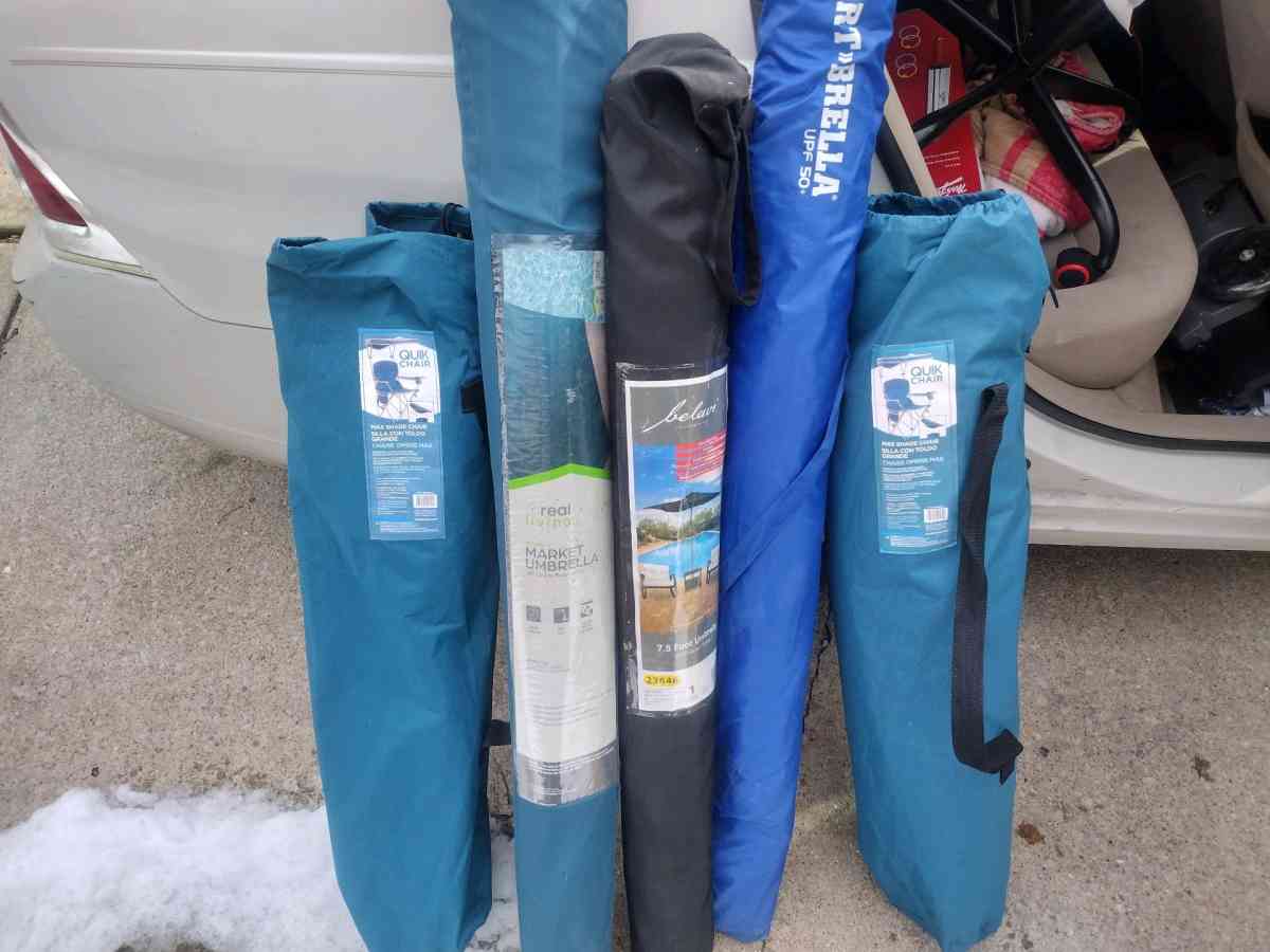 two chairs with canopies over the top three umbrellas 50 eac - Caseyville, Illinois