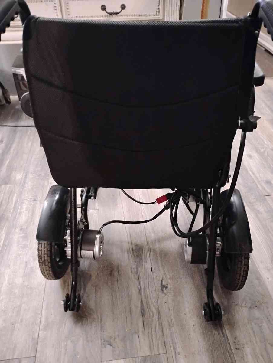 Motorized Wheelchair with Dual Batteries and Charger - Phenix City, Alabama - FleaMarketBay
