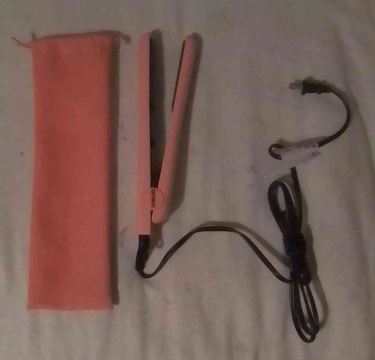 orange and black curling iron - Evans, Colorado