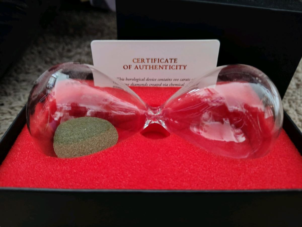 vintage old school hour glass with 100 carats of diamonds