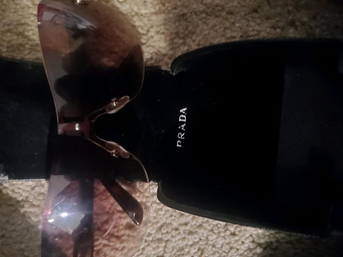 Prada Rimless Glasses with case