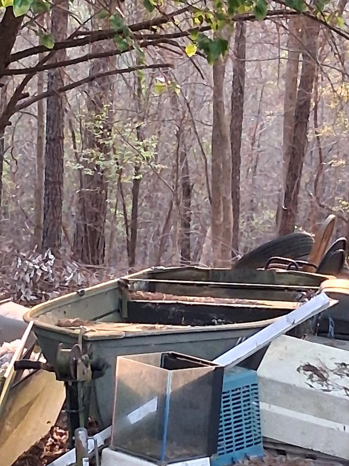 John boat with trolling motor and trailer