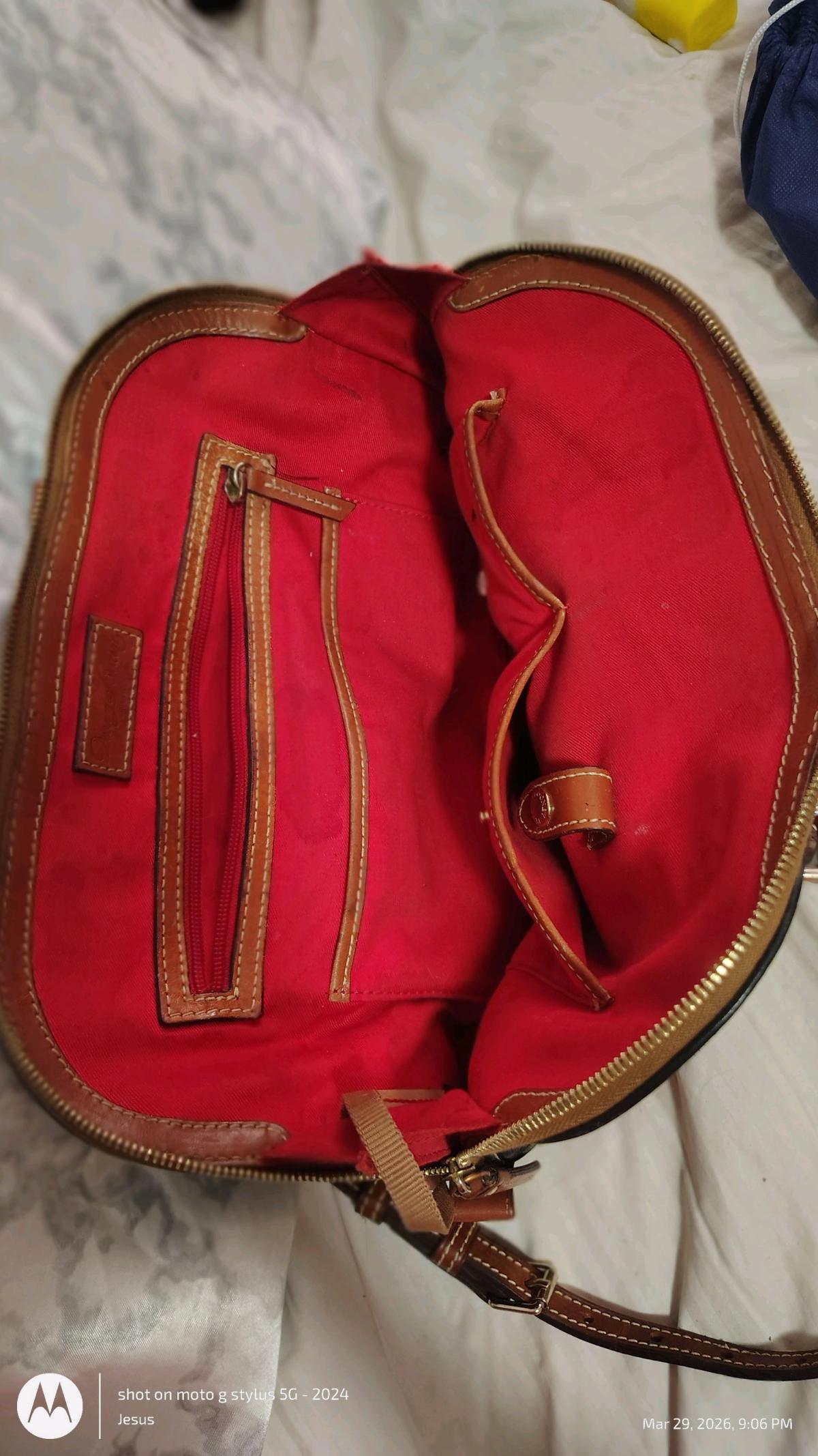 Dooney and Burke black purse with red in lining - Edmond, Oklahoma - FleaMarketBay