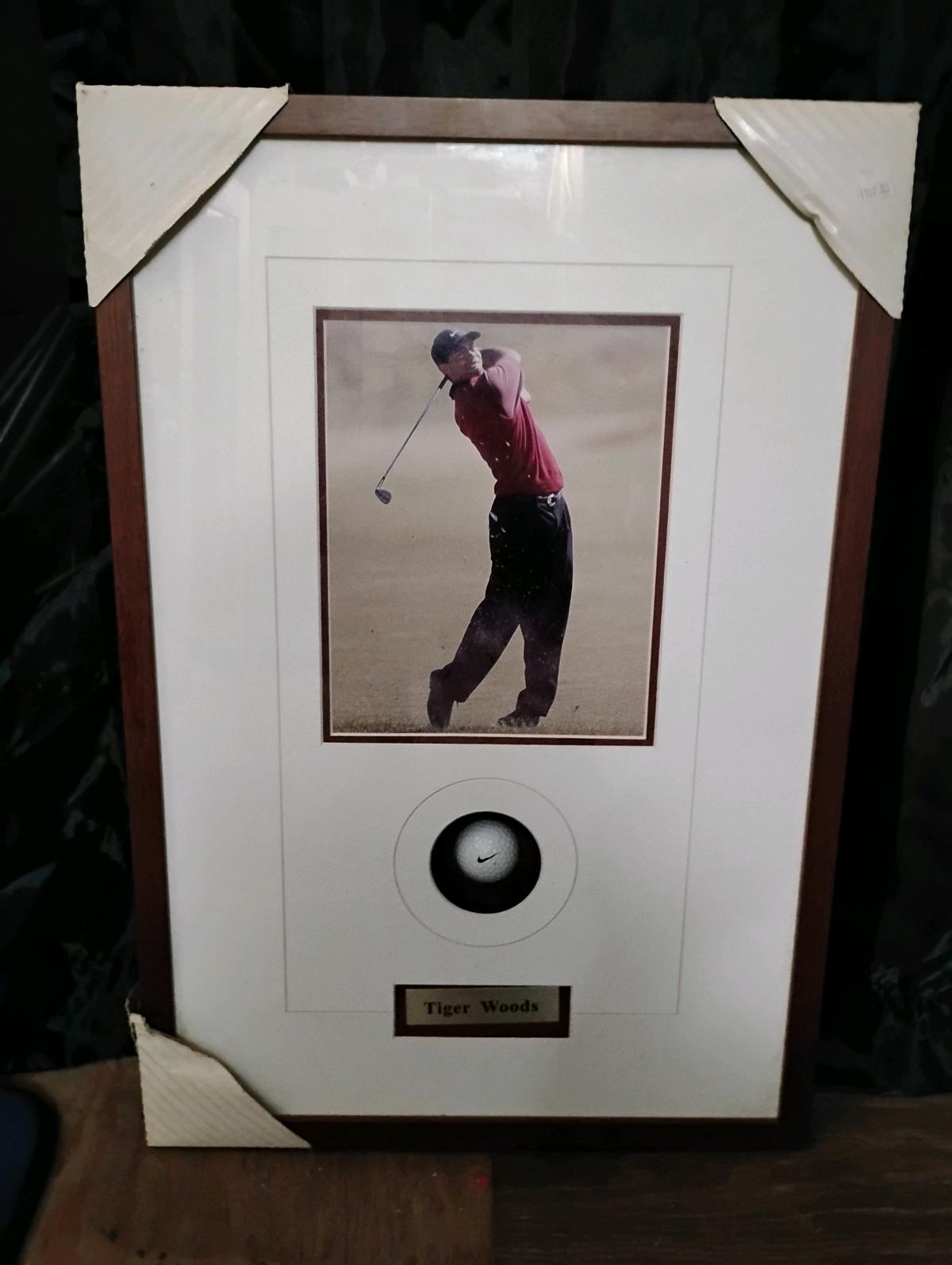 Tiger Woods unsigned framed photo with Nike golf ball