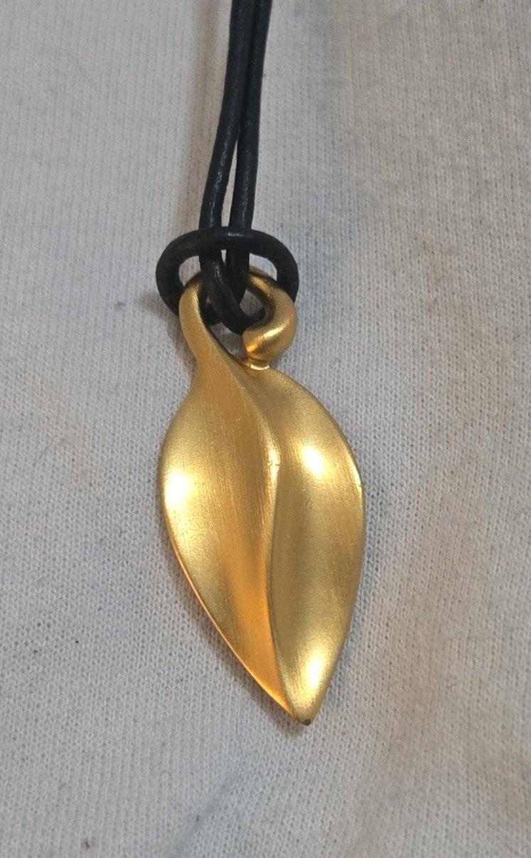 Monet Gold Tone Leaf Pendant Necklace on Black Cord - Adamsville, Alabama - FleaMarketBay
