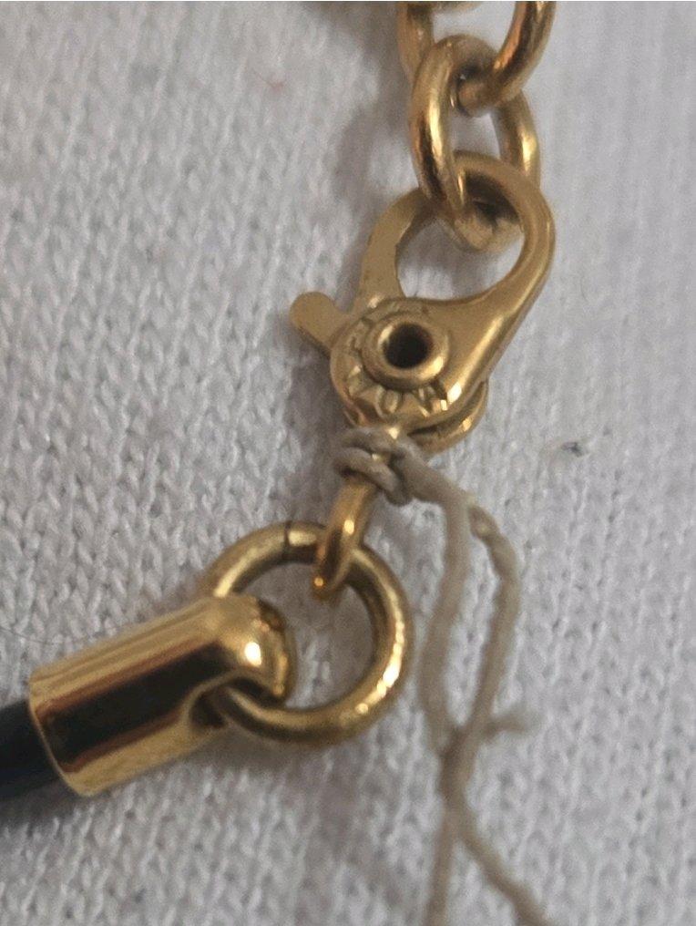 Monet Gold Tone Leaf Pendant Necklace on Black Cord - Adamsville, Alabama - FleaMarketBay